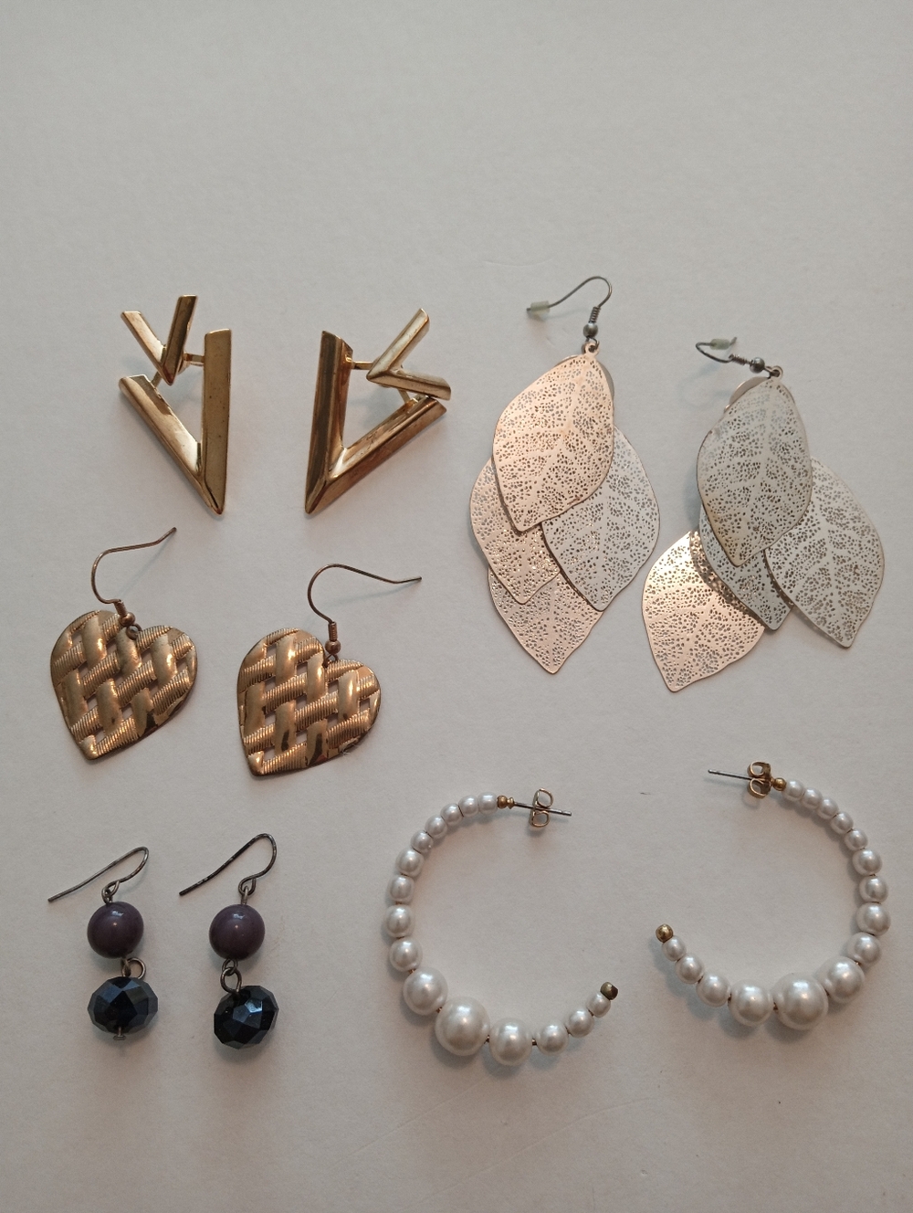 #1183.  5 Piece Assorted, Gold Toned, Faux Pearl, Purple & Leaf Earring Bundle